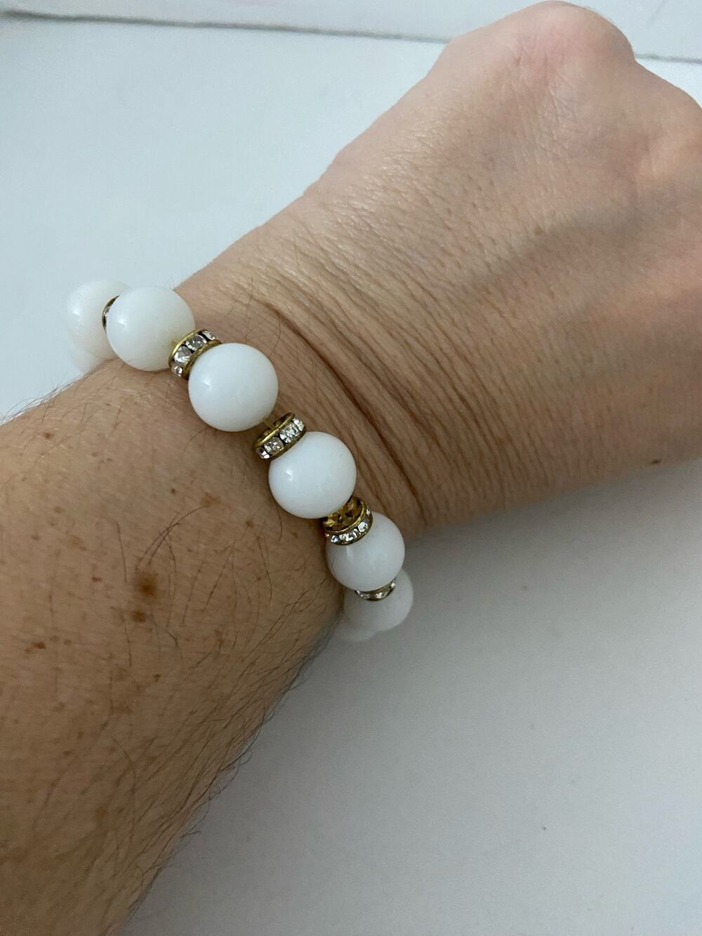 white bead bracelet